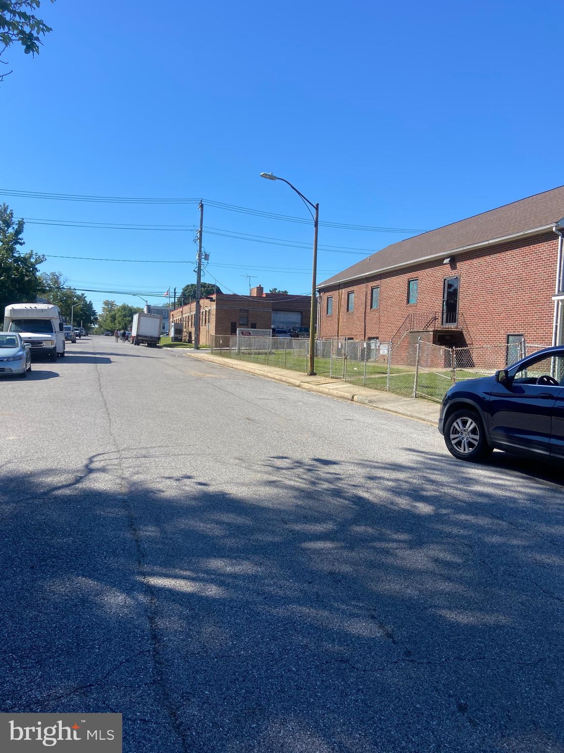 501 Baltic Avenue, Unit 1 Baltimore, MD 21225 - Photo 8 of 8 a front view of a house with a yard
