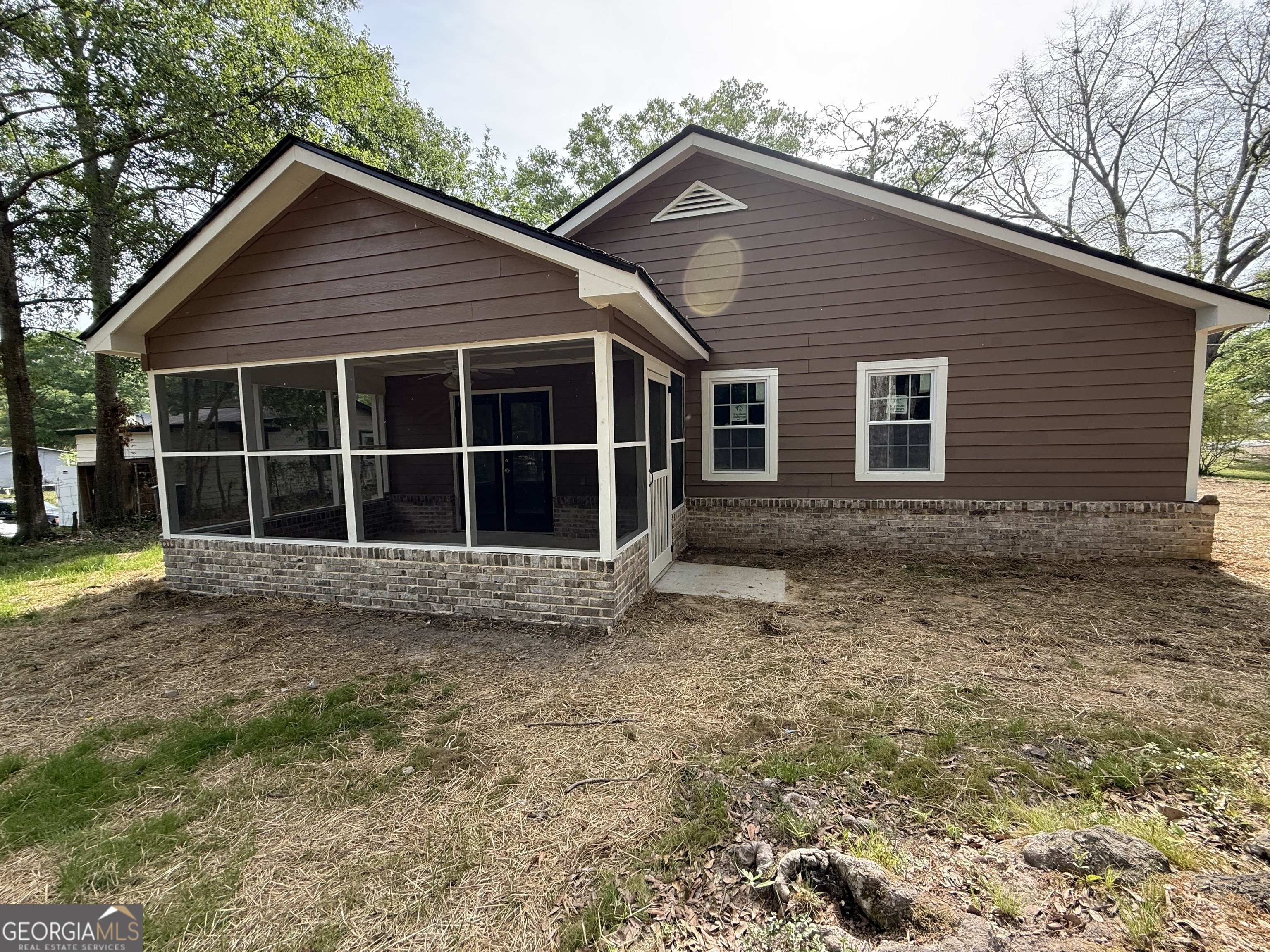 240 Sims Street Barnesville, GA 30204 - Photo 24 of 25 a front view of a house with a large window