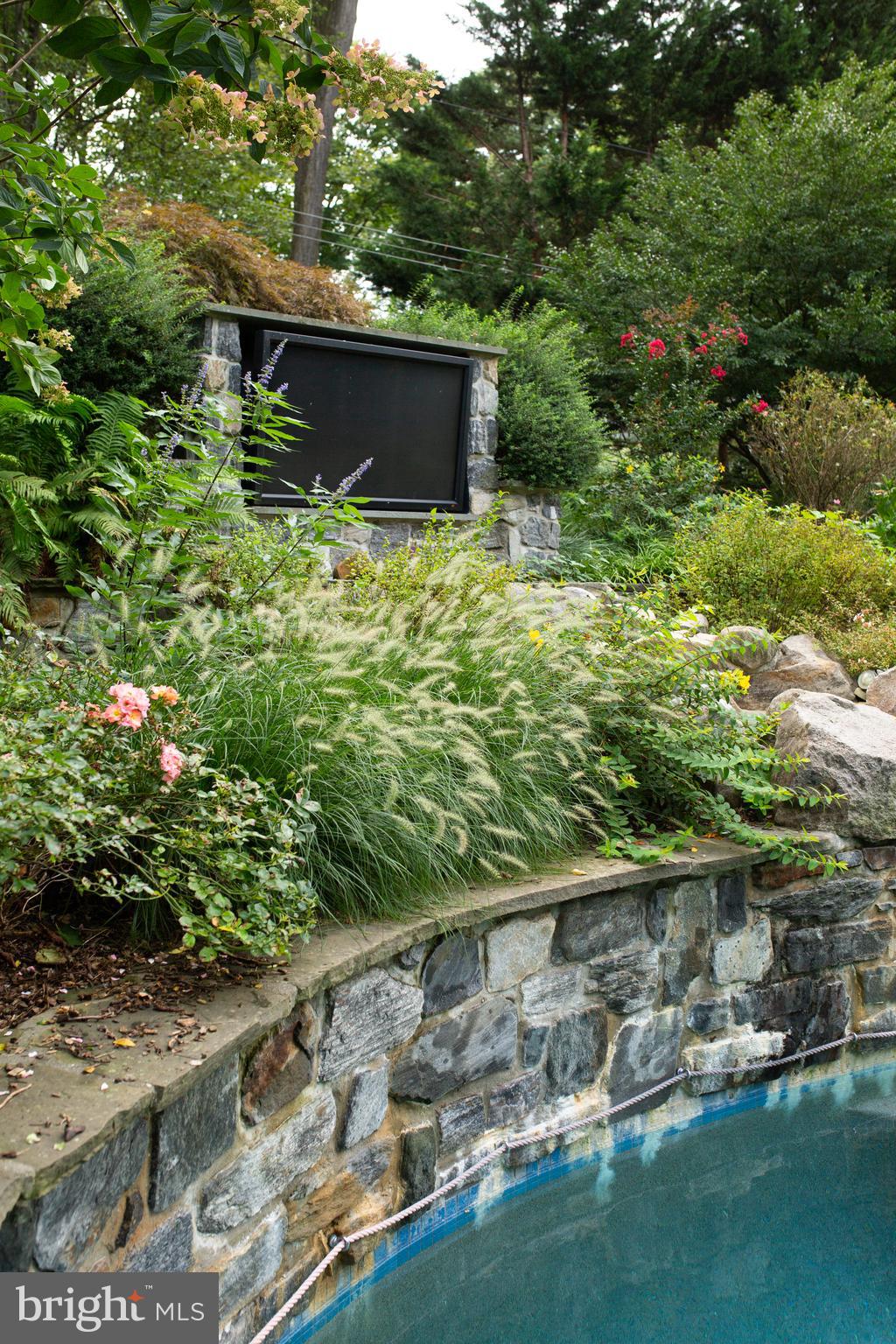 626 Fernfield Circle Wayne, PA 19087 - Photo 15 of 54 Stone wall, boulder waterfall and TV entertainment