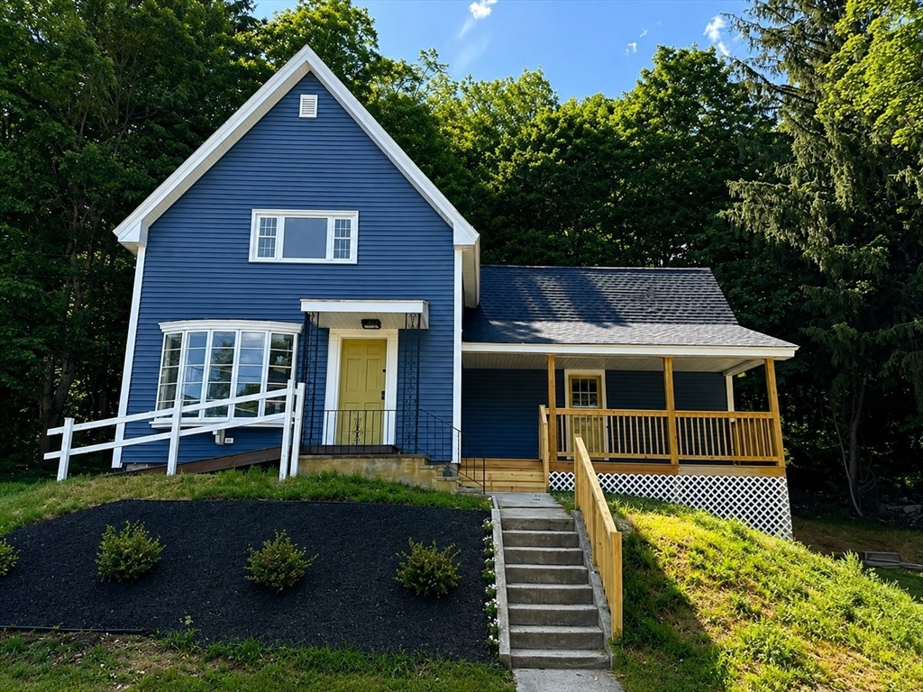 37 Bridge Street Monson, MA 01057 - Photo 23 of 35 a front view of a house with a yard