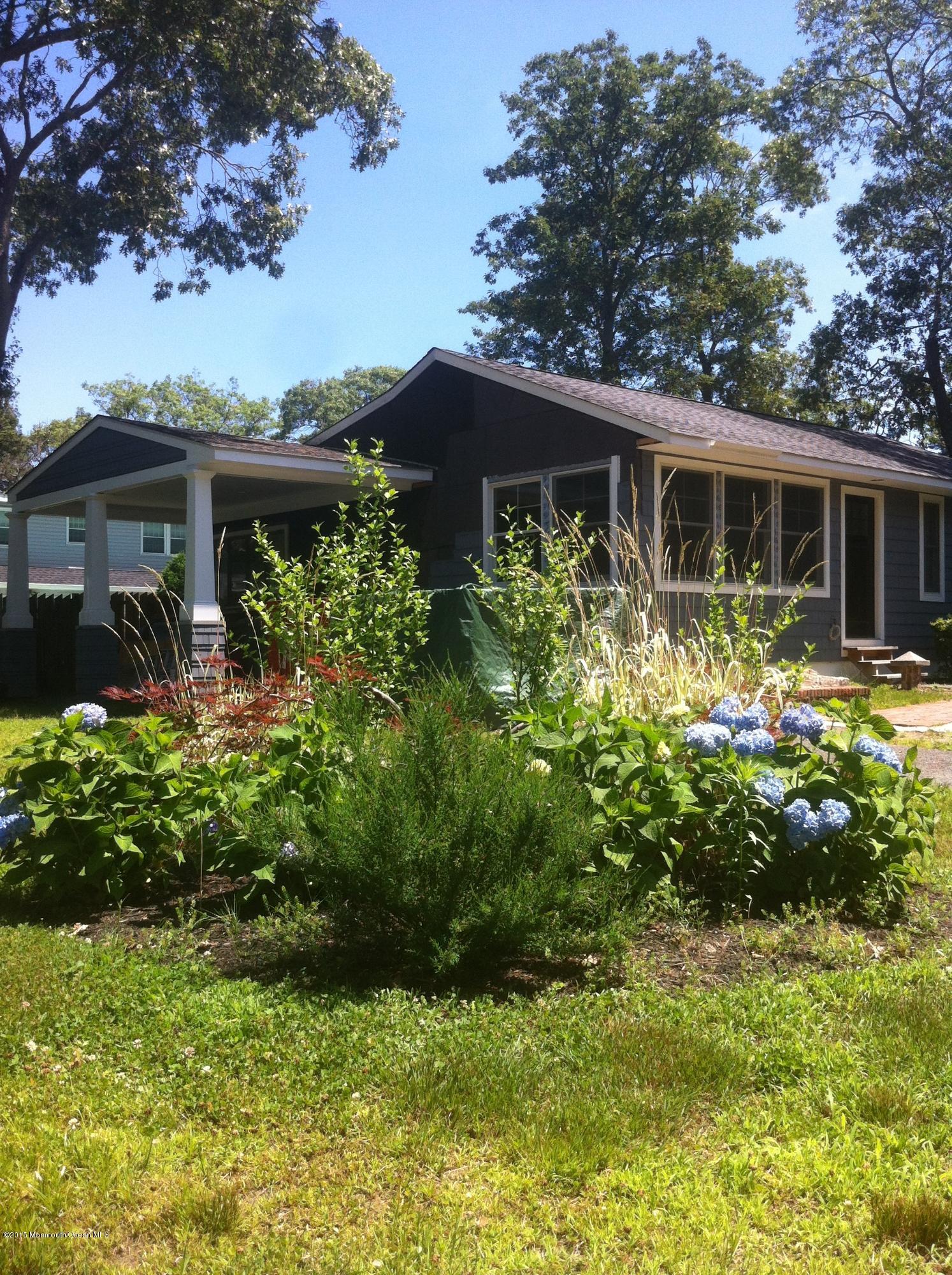 536 Hunters Road Brick, NJ 08724 - Photo 3 of 33 a view of a house with a yard and garden