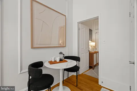 a bathroom with a sink a mirror and a shower