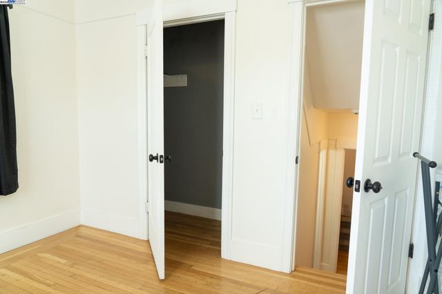 a view of a bathroom from a hallway