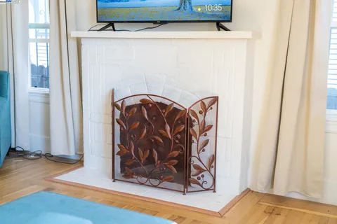 a view of front door with wooden floor