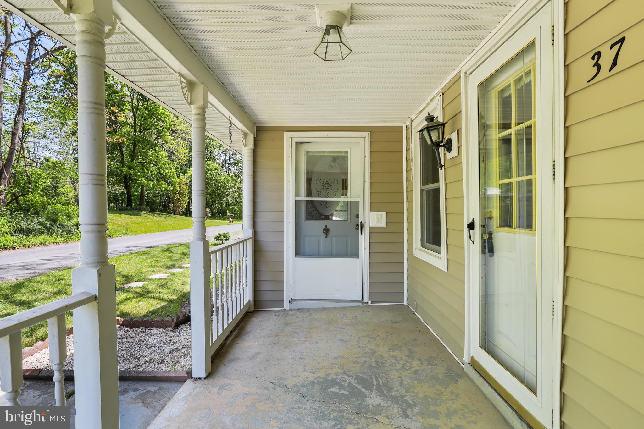 37 Corner Road Edinburg, VA 22824 - Photo 9 of 42 Covered front porch