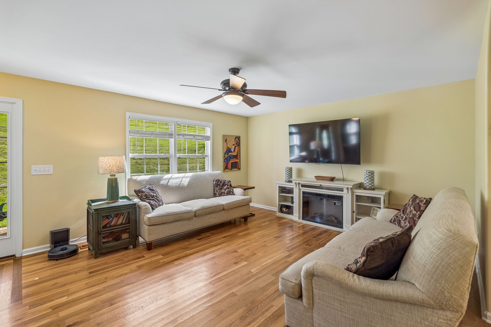 1548 Heller Ridge Spring Hill, TN 37174 - Photo 14 of 73 a living room with furniture flat screen tv and a fireplace
