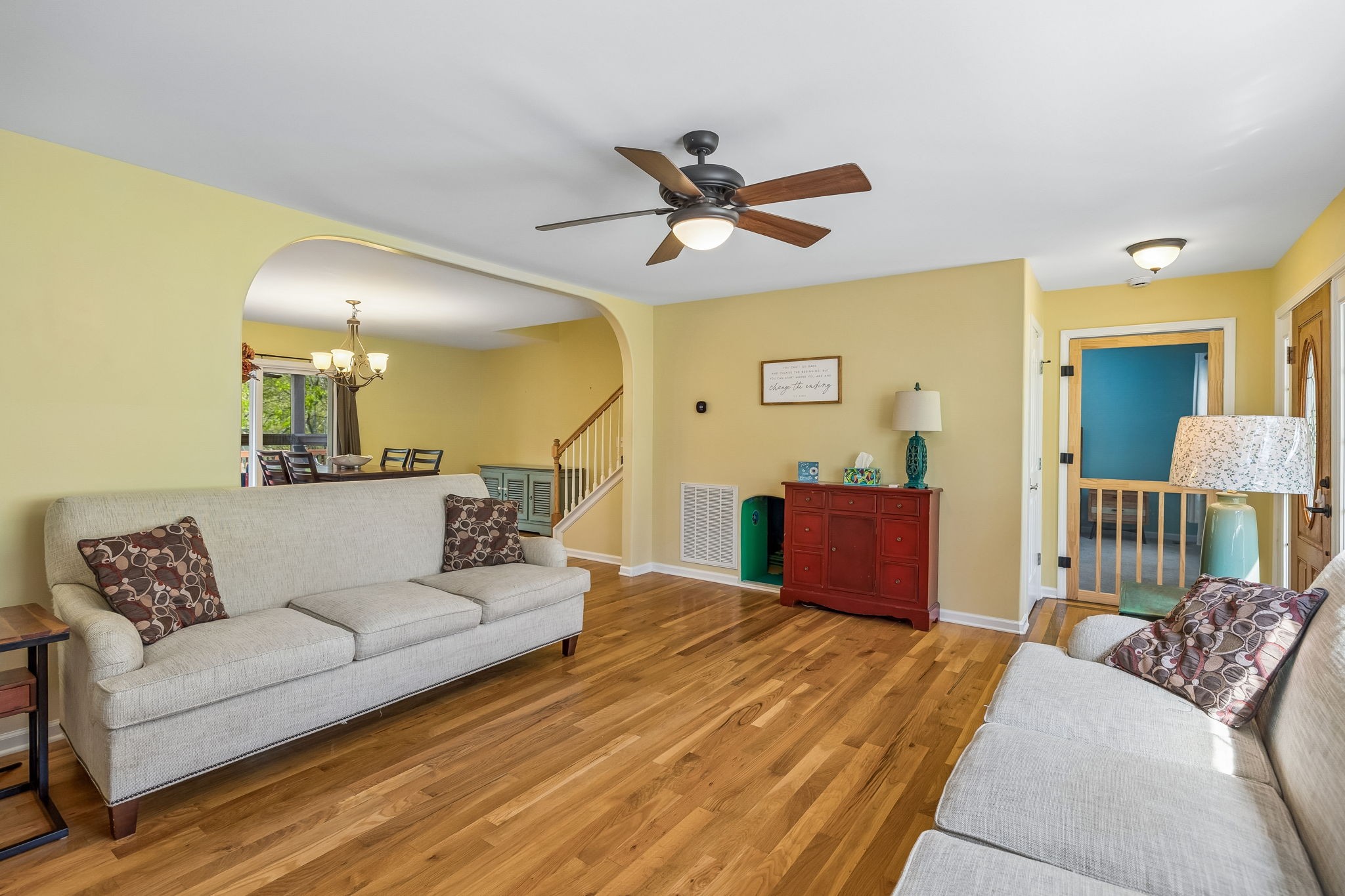 1548 Heller Ridge Spring Hill, TN 37174 - Photo 15 of 73 a living room with a couch and a chandelier