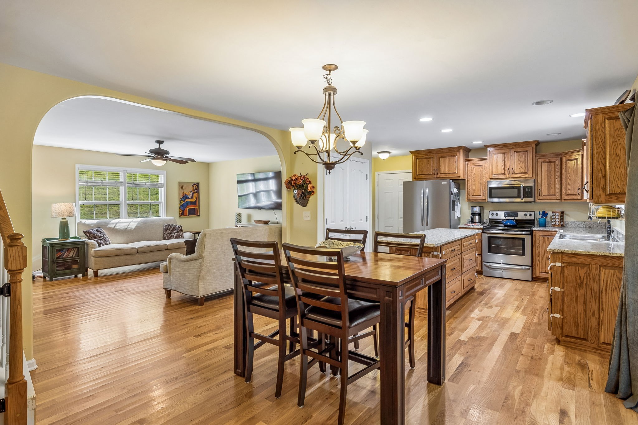 1548 Heller Ridge Spring Hill, TN 37174 - Photo 19 of 73 a view of a dining room with furniture window and wooden floor