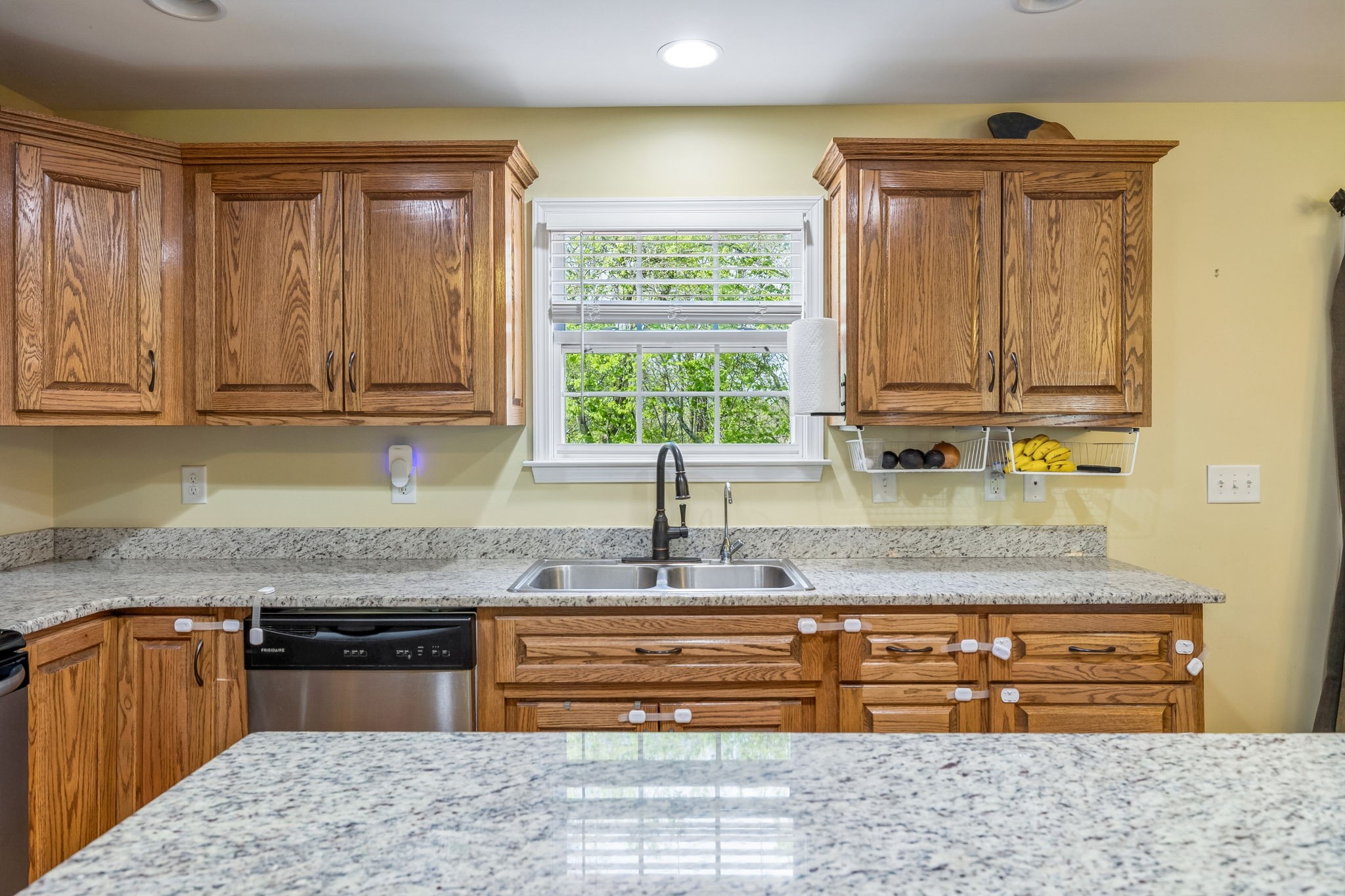 1548 Heller Ridge Spring Hill, TN 37174 - Photo 23 of 73 a kitchen with granite countertop a sink and a stove