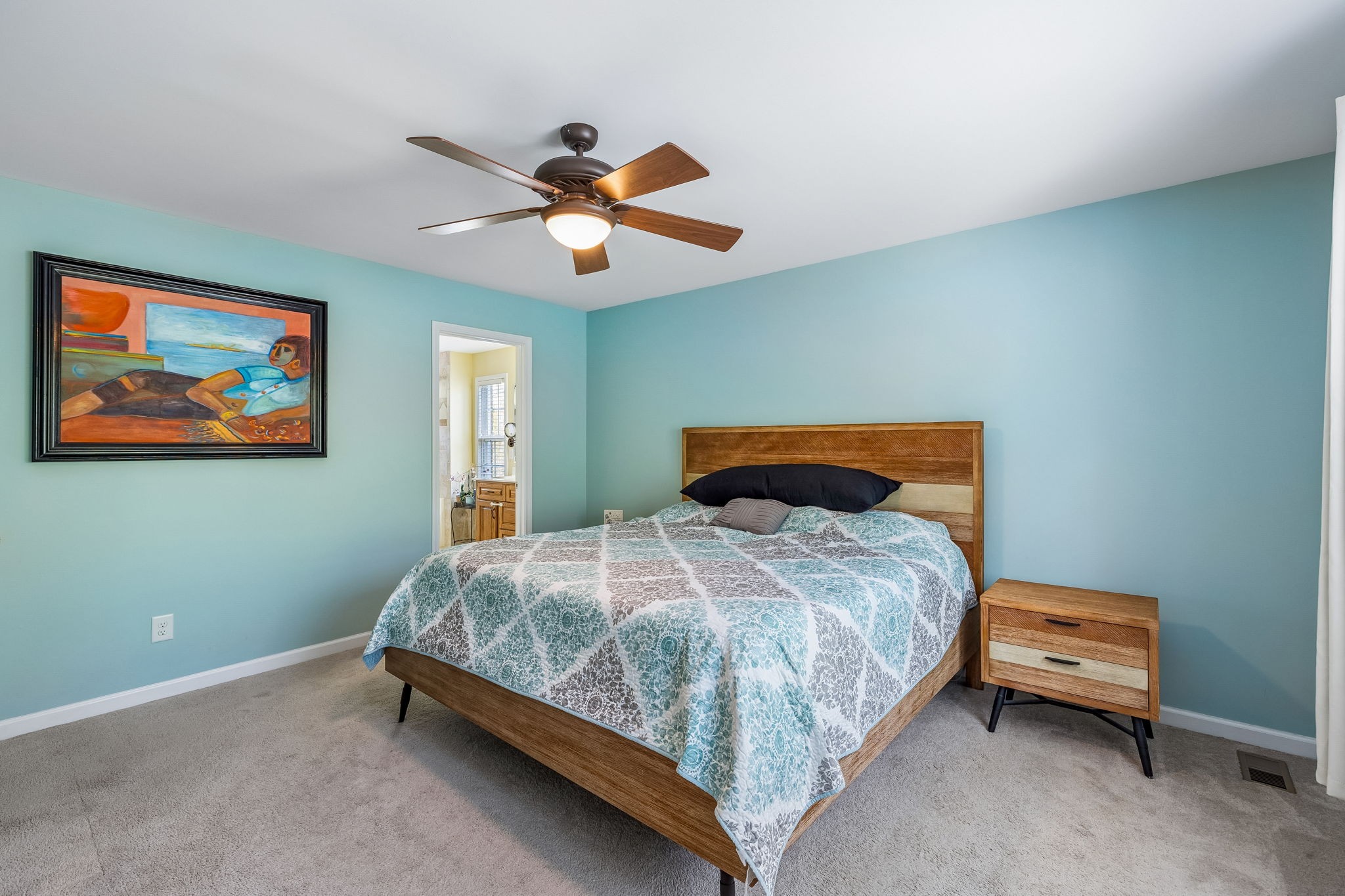 1548 Heller Ridge Spring Hill, TN 37174 - Photo 25 of 73 a bedroom with a bed and a painting on the wall