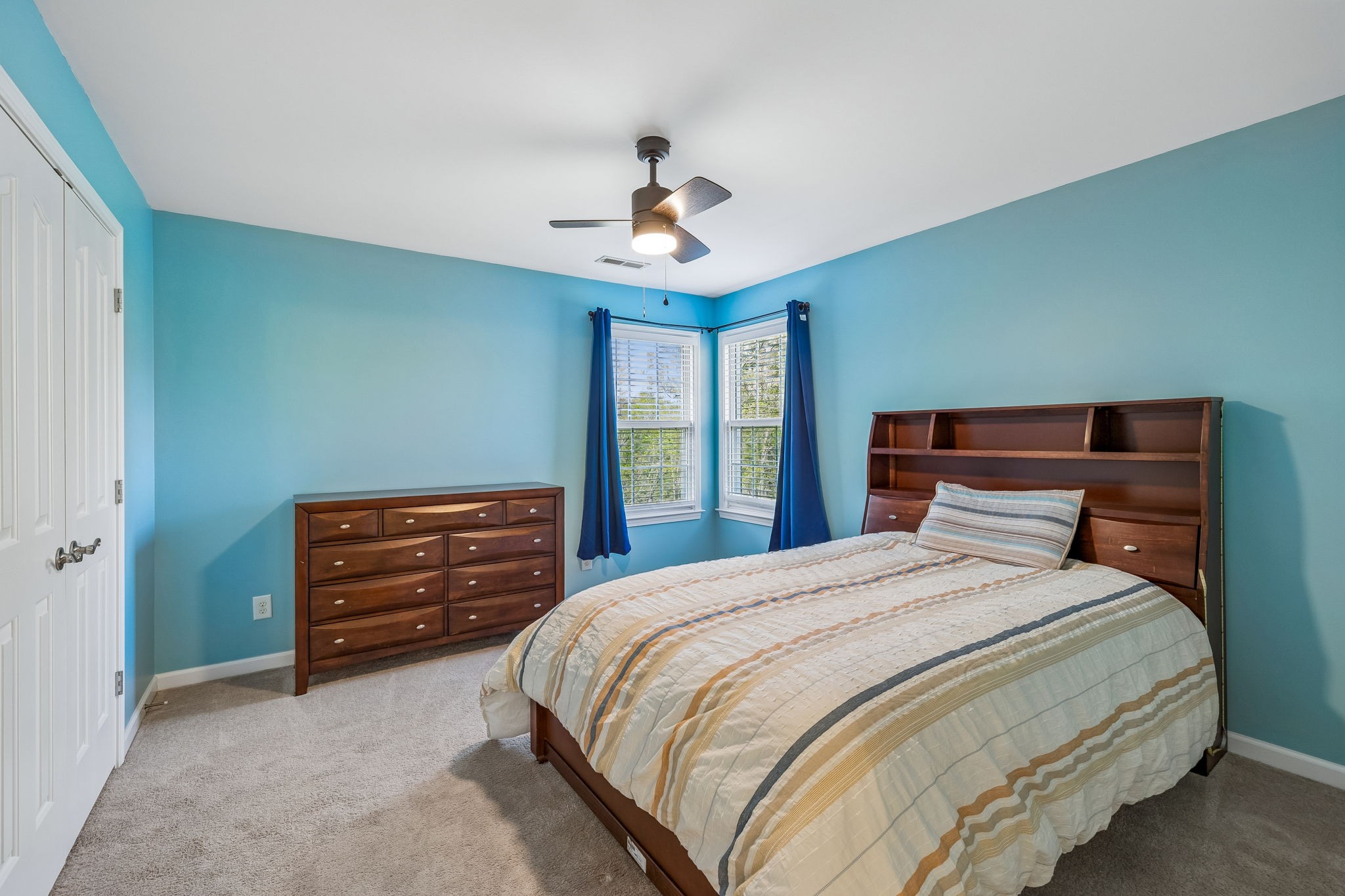 1548 Heller Ridge Spring Hill, TN 37174 - Photo 38 of 73 a bedroom with a bed and a dresser