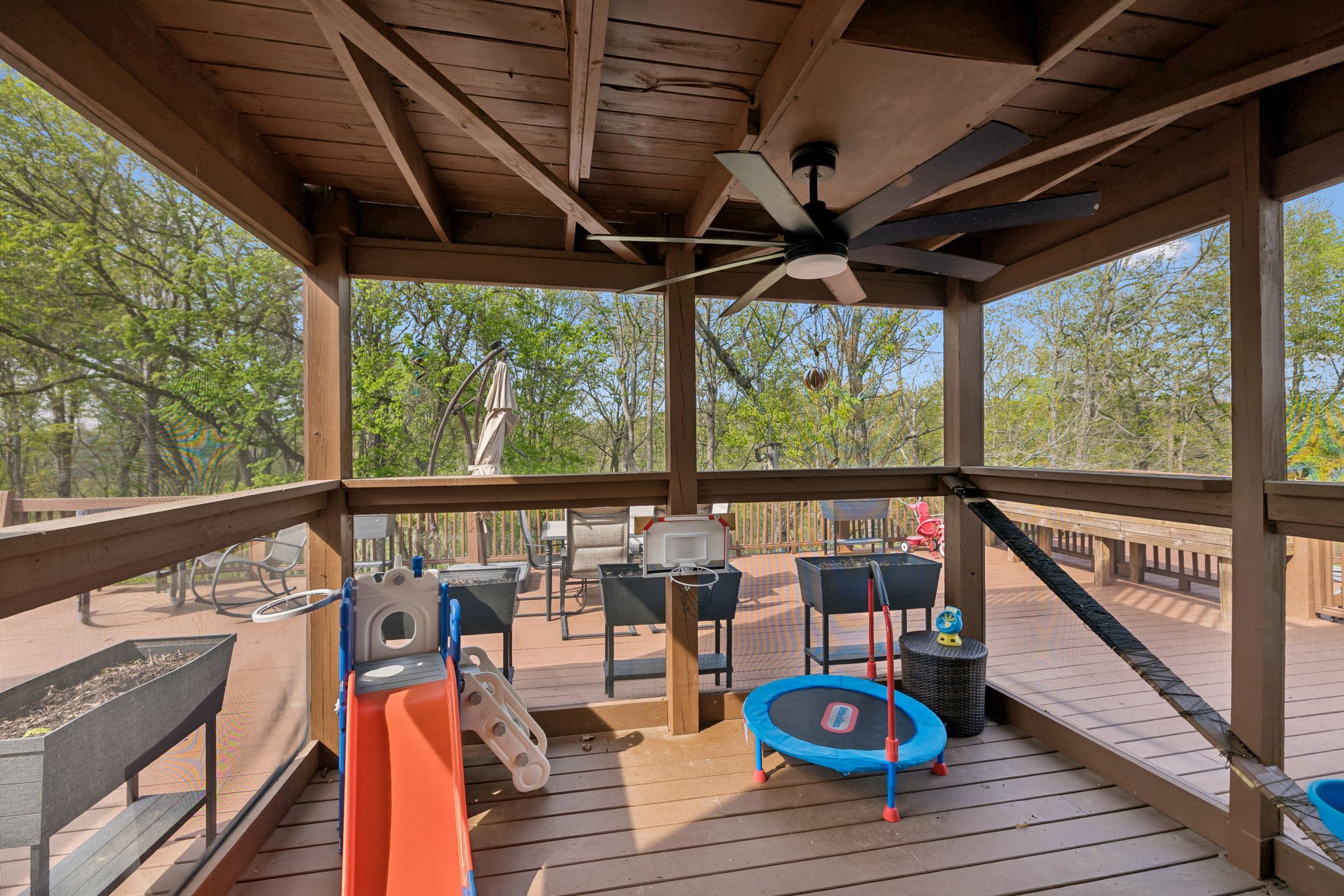 1548 Heller Ridge Spring Hill, TN 37174 - Photo 39 of 73 a view of balcony with chairs and wooden floor