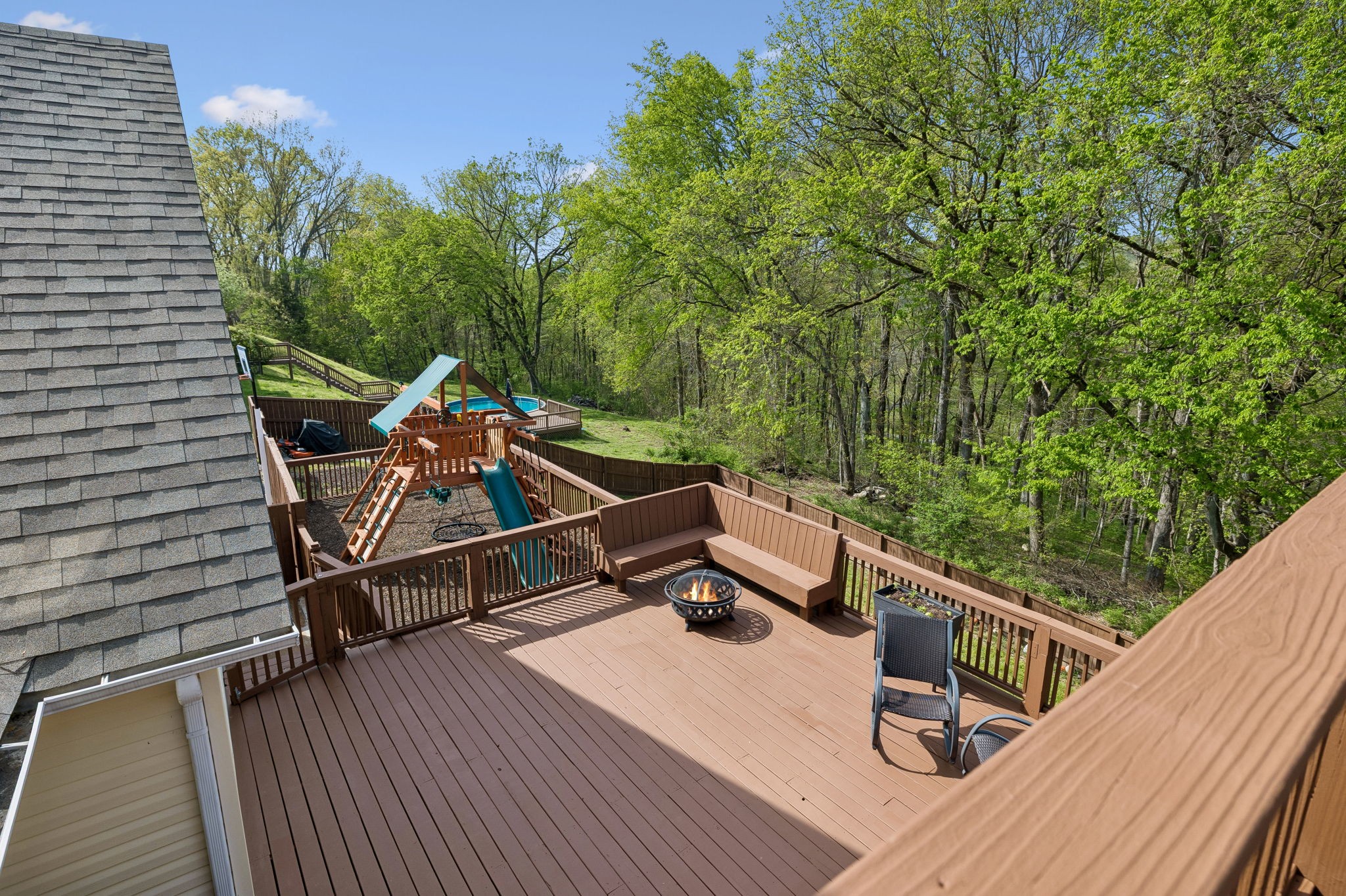 1548 Heller Ridge Spring Hill, TN 37174 - Photo 42 of 73 a view of a roof deck with wooden floor and seating space