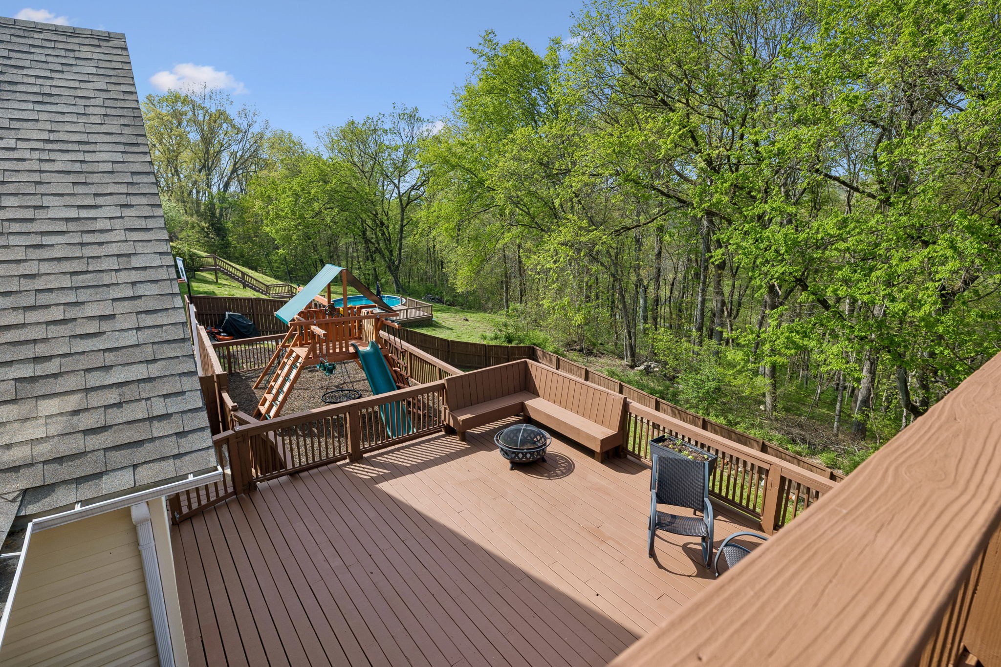 1548 Heller Ridge Spring Hill, TN 37174 - Photo 43 of 73 a view of a roof deck with wooden floor and seating space