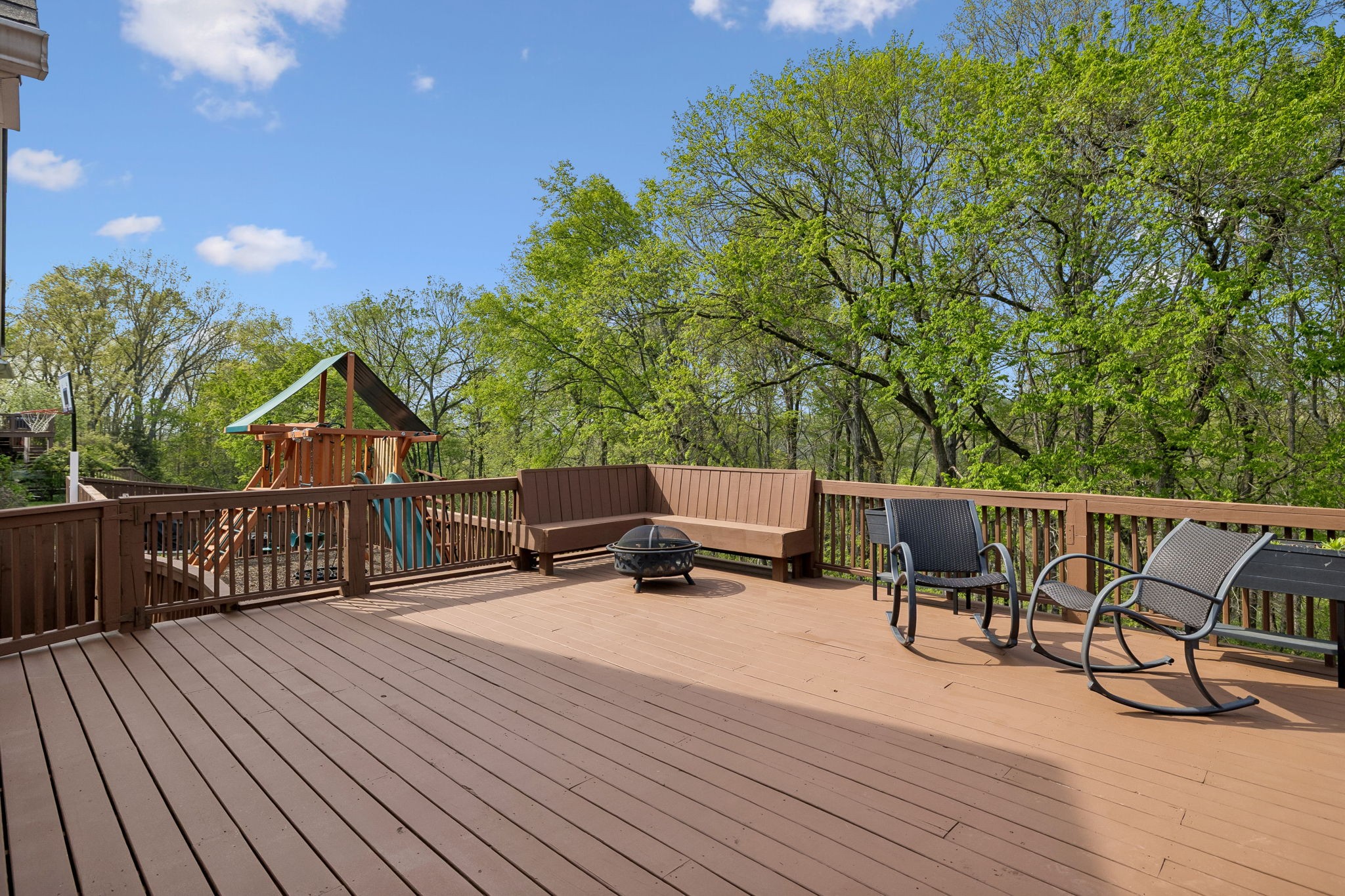 1548 Heller Ridge Spring Hill, TN 37174 - Photo 45 of 73 a roof deck with table and chairs and wooden floor