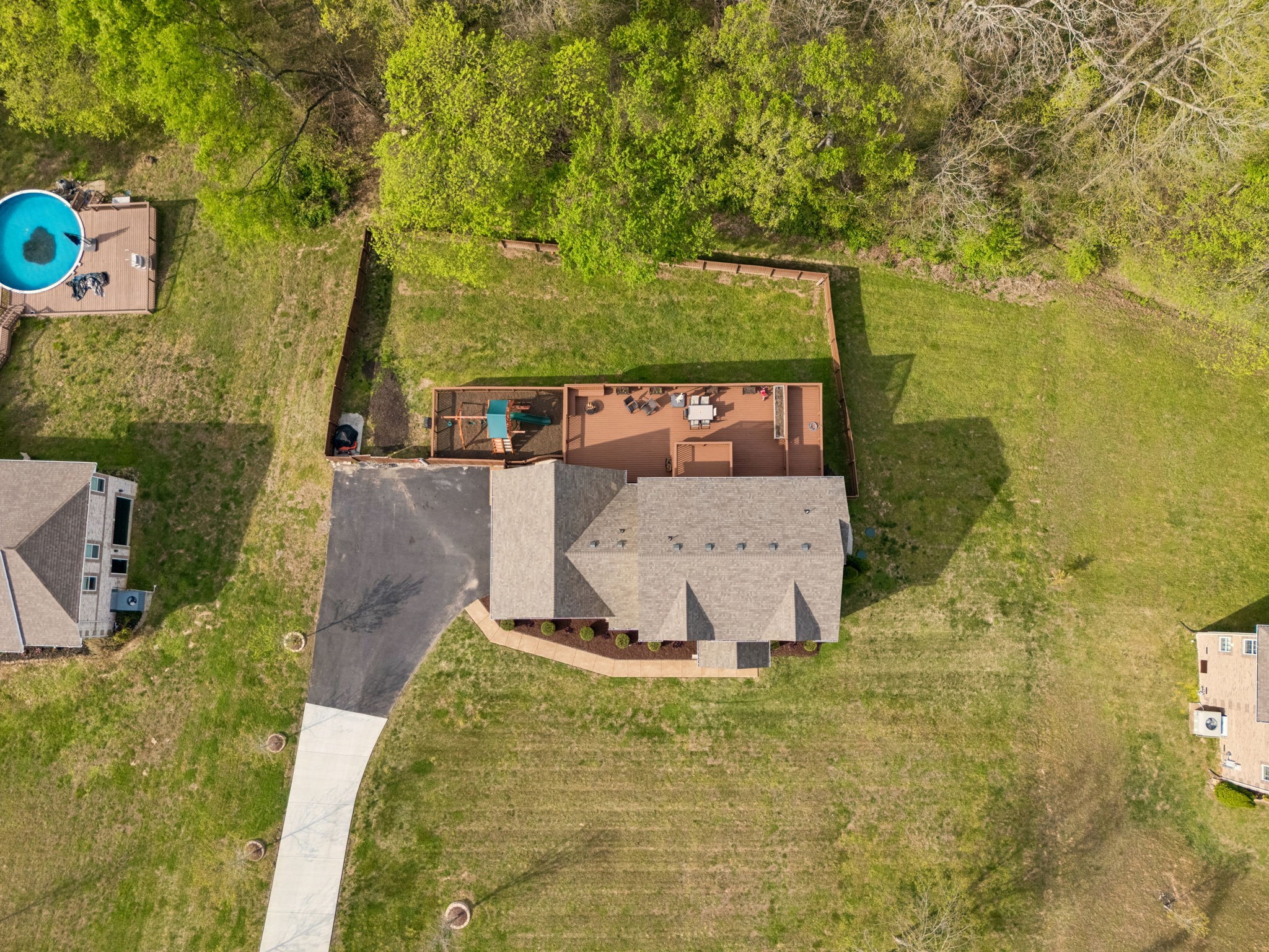 1548 Heller Ridge Spring Hill, TN 37174 - Photo 58 of 73 a view of a balcony with floor to ceiling window and tree