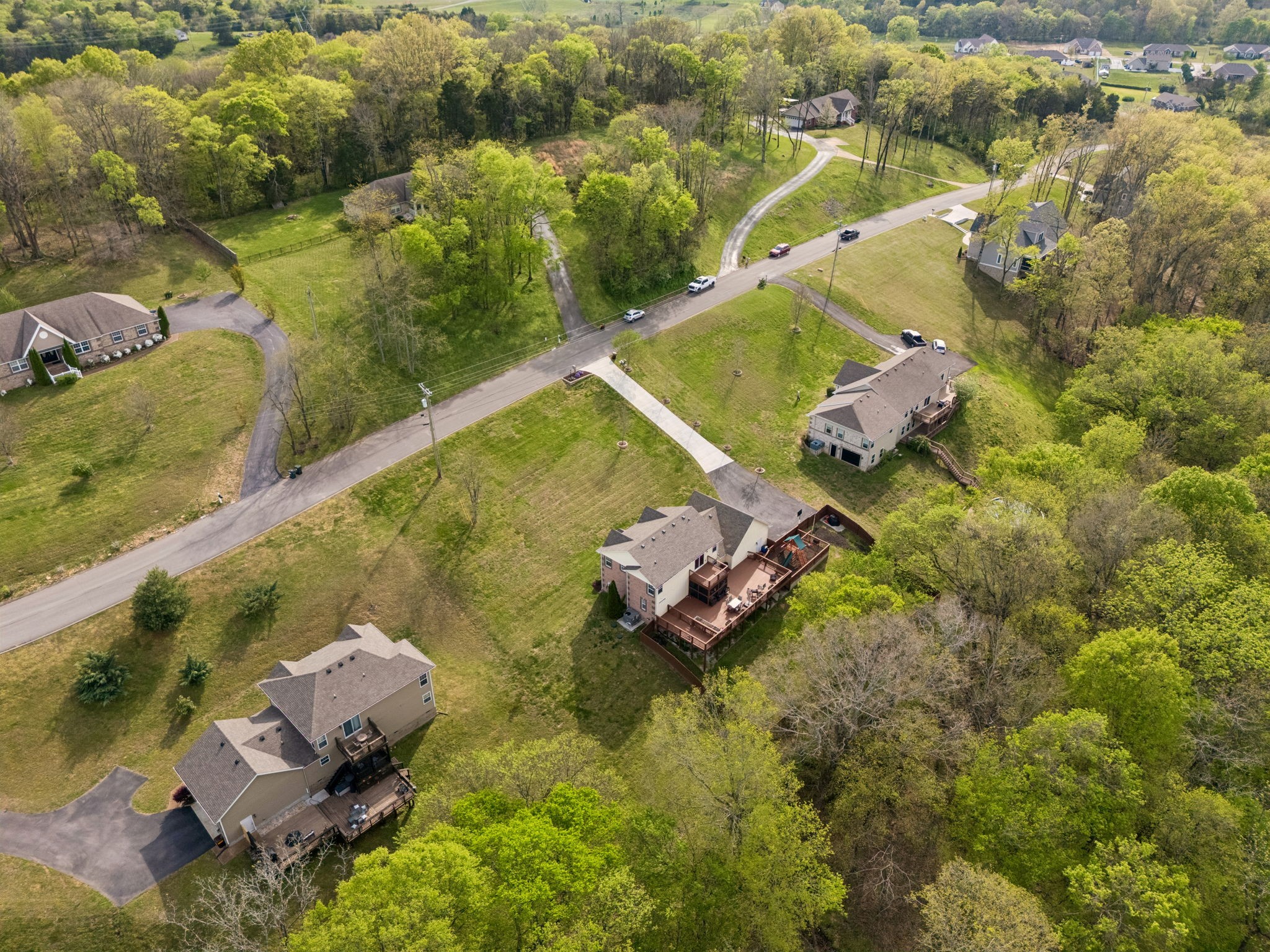 1548 Heller Ridge Spring Hill, TN 37174 - Photo 65 of 73 an aerial view of a house with a lake view