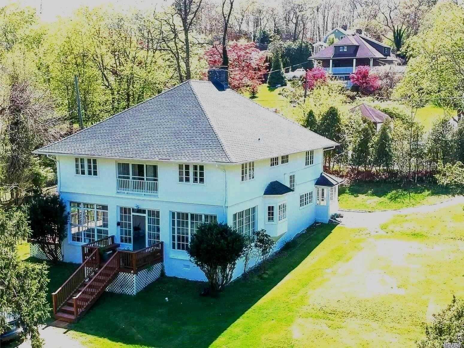 5 Tagliabue Road Shoreham, NY 11786 - Photo 1 of 1 a aerial view of a house with swimming pool and garden