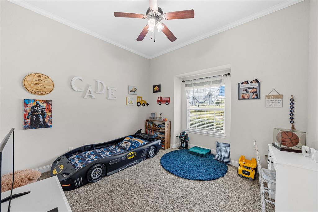 201 Camino Del Rancho Lorena, TX 76655 - Photo 22 of 35 a room with toys and a chandelier