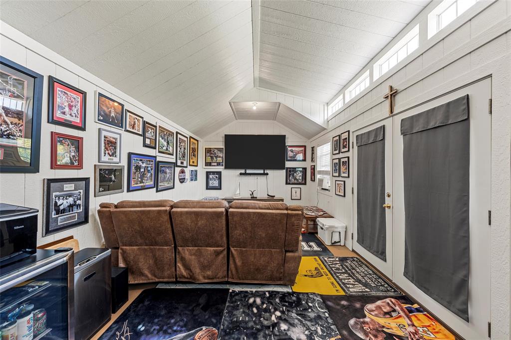 201 Camino Del Rancho Lorena, TX 76655 - Photo 29 of 35 a room with furniture and flat screen tv