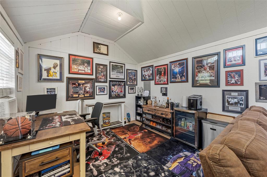 201 Camino Del Rancho Lorena, TX 76655 - Photo 30 of 35 a livingroom with workspace and a couch