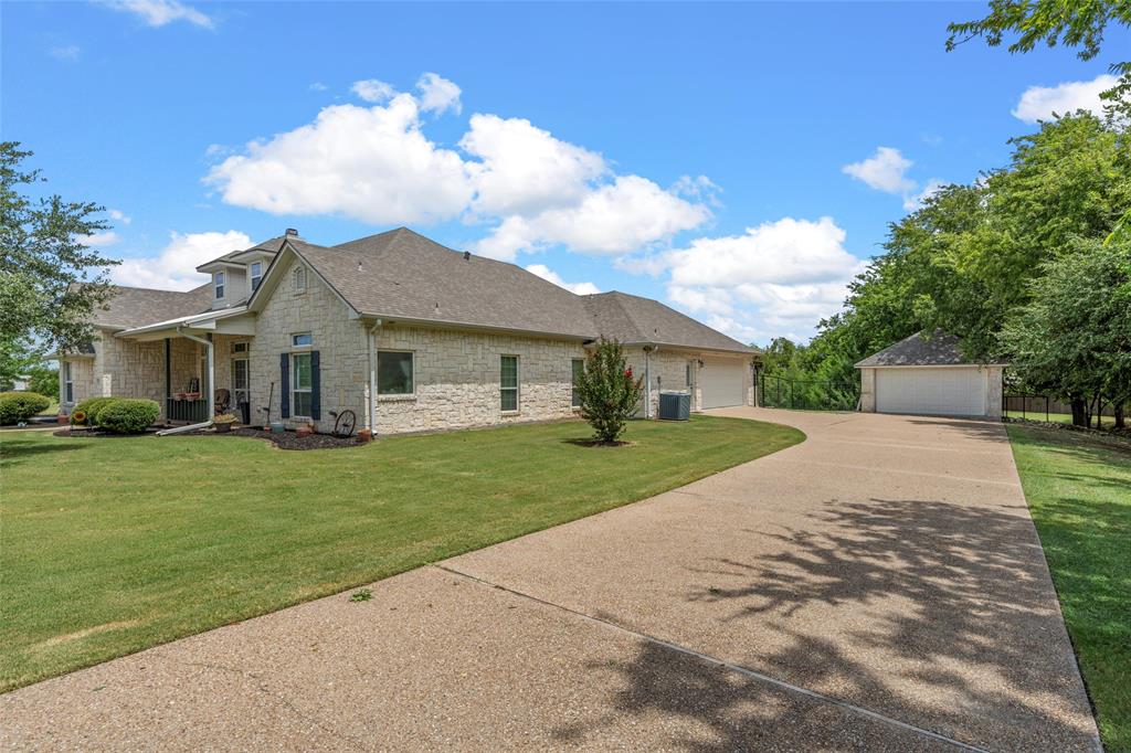 201 Camino Del Rancho Lorena, TX 76655 - Photo 3 of 35 a front view of a house with a yard