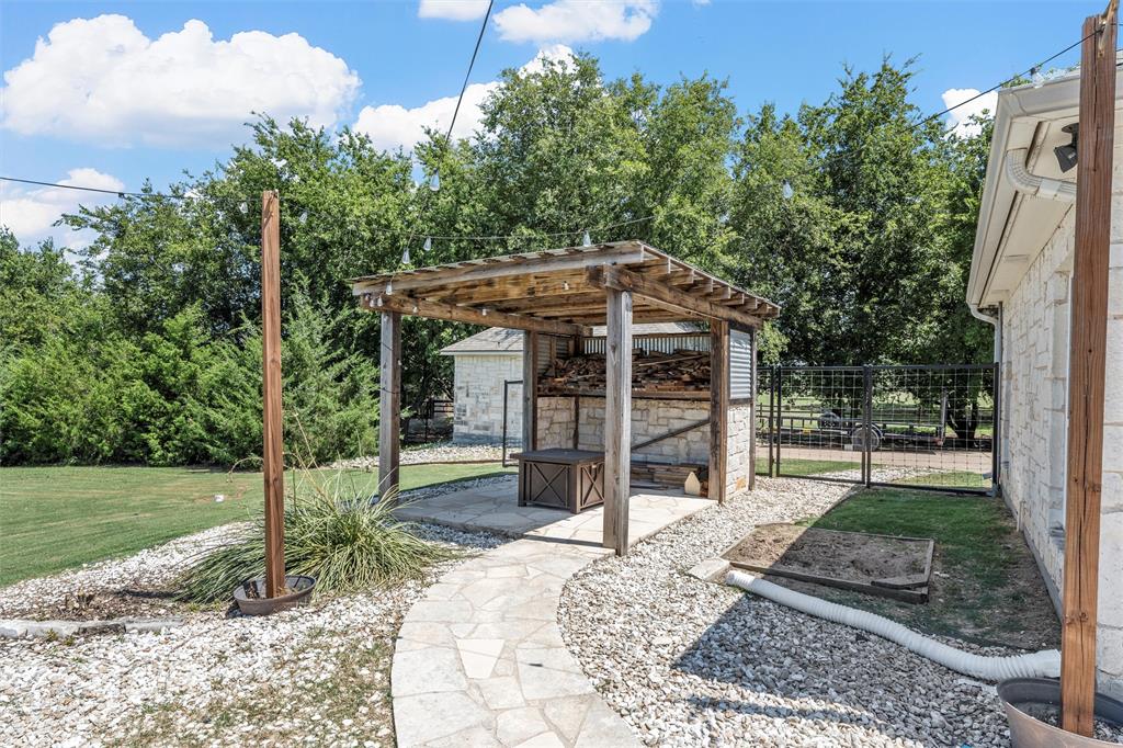 201 Camino Del Rancho Lorena, TX 76655 - Photo 32 of 35 a view of a house with backyard porch and sitting area