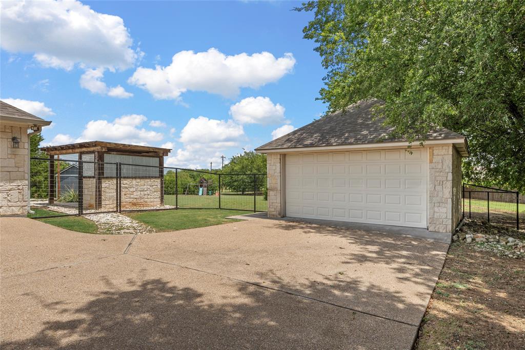 201 Camino Del Rancho Lorena, TX 76655 - Photo 4 of 35 a view of a house with a backyard