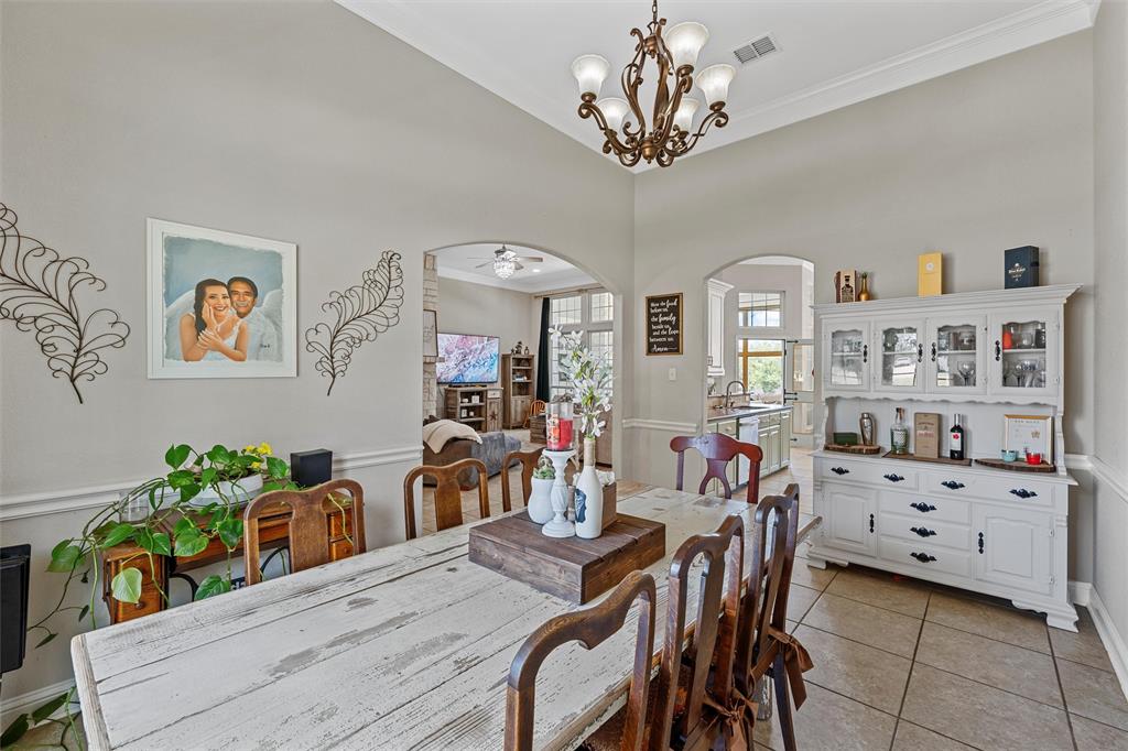 201 Camino Del Rancho Lorena, TX 76655 - Photo 9 of 35 a view of a dining room with furniture