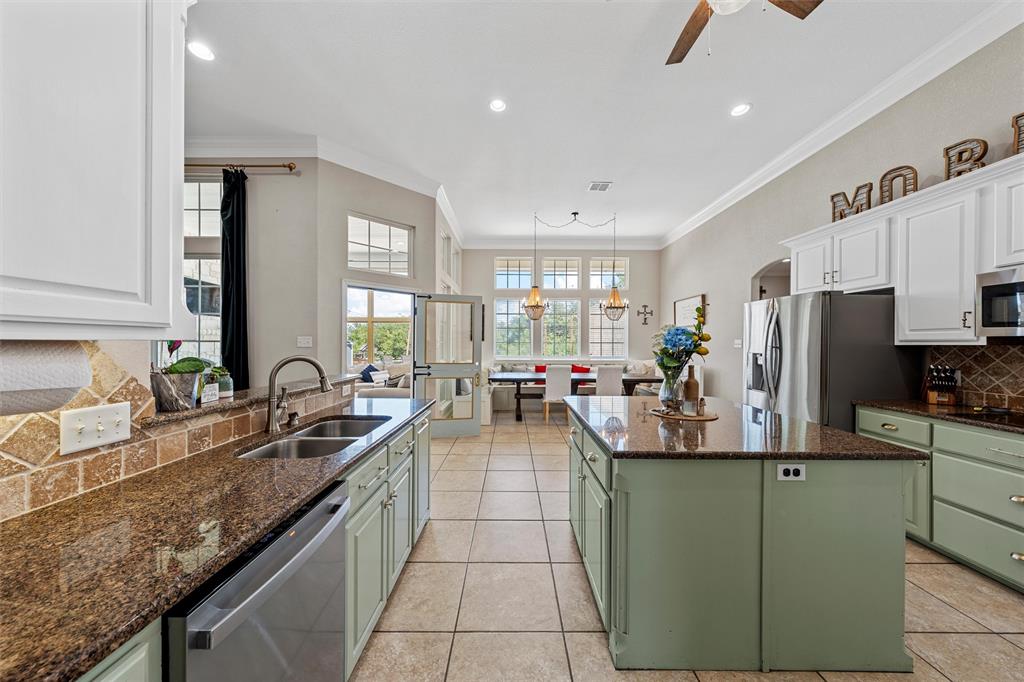 201 Camino Del Rancho Lorena, TX 76655 - Photo 10 of 35 a kitchen with counter top space cabinets and stainless steel appliances