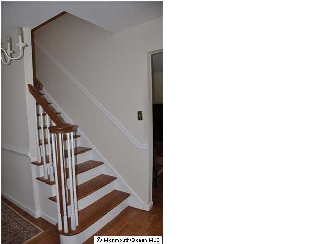 27 Cambridge Road Freehold, NJ 07728 - Photo 3 of 3 a view of entryway with staircase