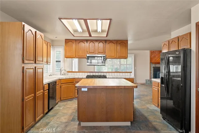 a bathroom with a sink a vanity and a mirror