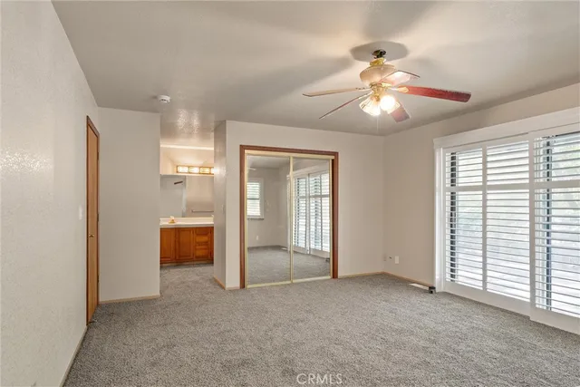 a bathroom with a sink double vanity and a mirror