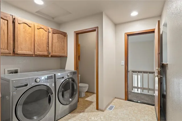 a view of backyard with plants and trees