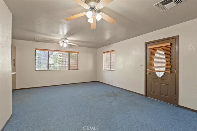 a view of lake with a yard