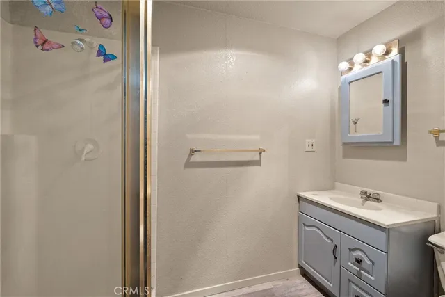 a view of yard covered with snow in front of house