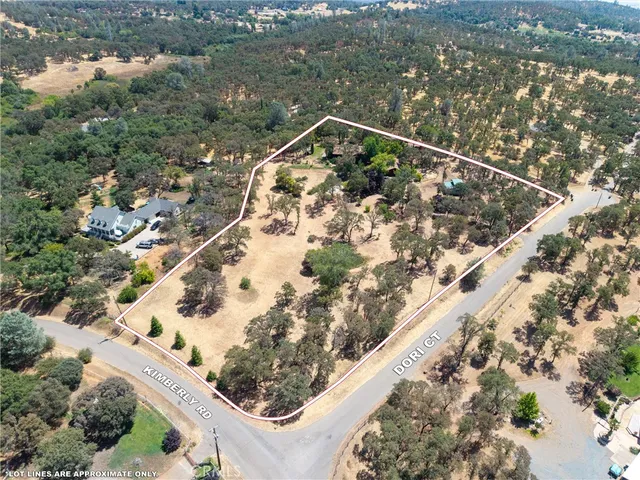 a kitchen that has a sink and a stove in it