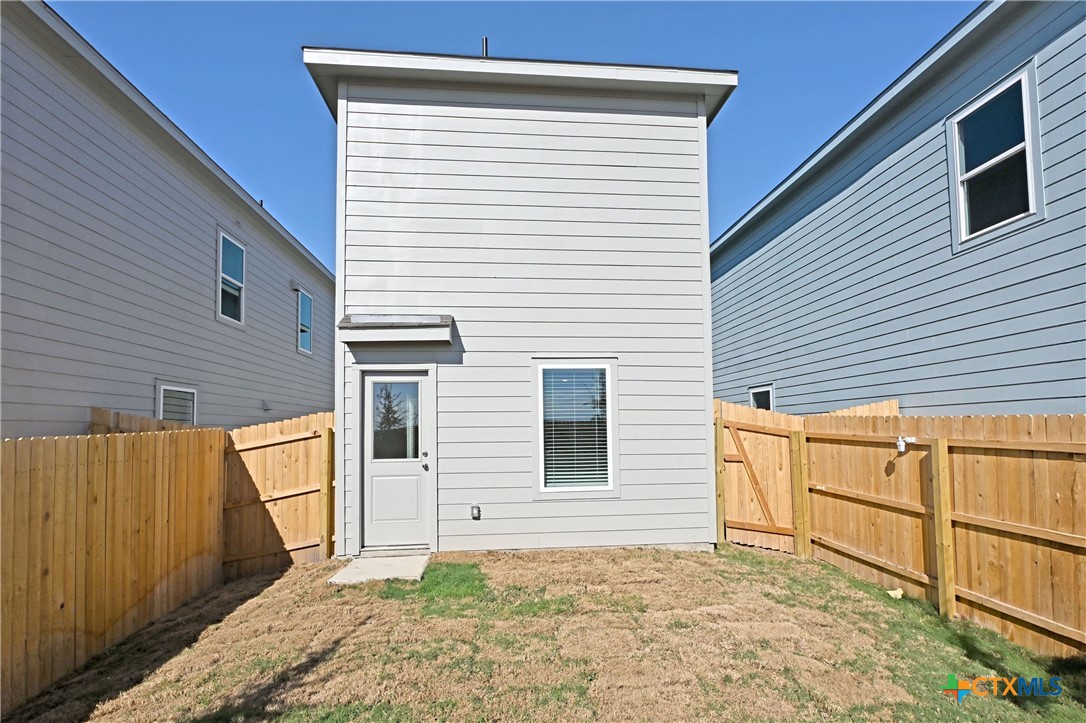 11806 Bluebell Ridge Converse, TX 78109 - Photo 10 of 20 a view of a house with a backyard