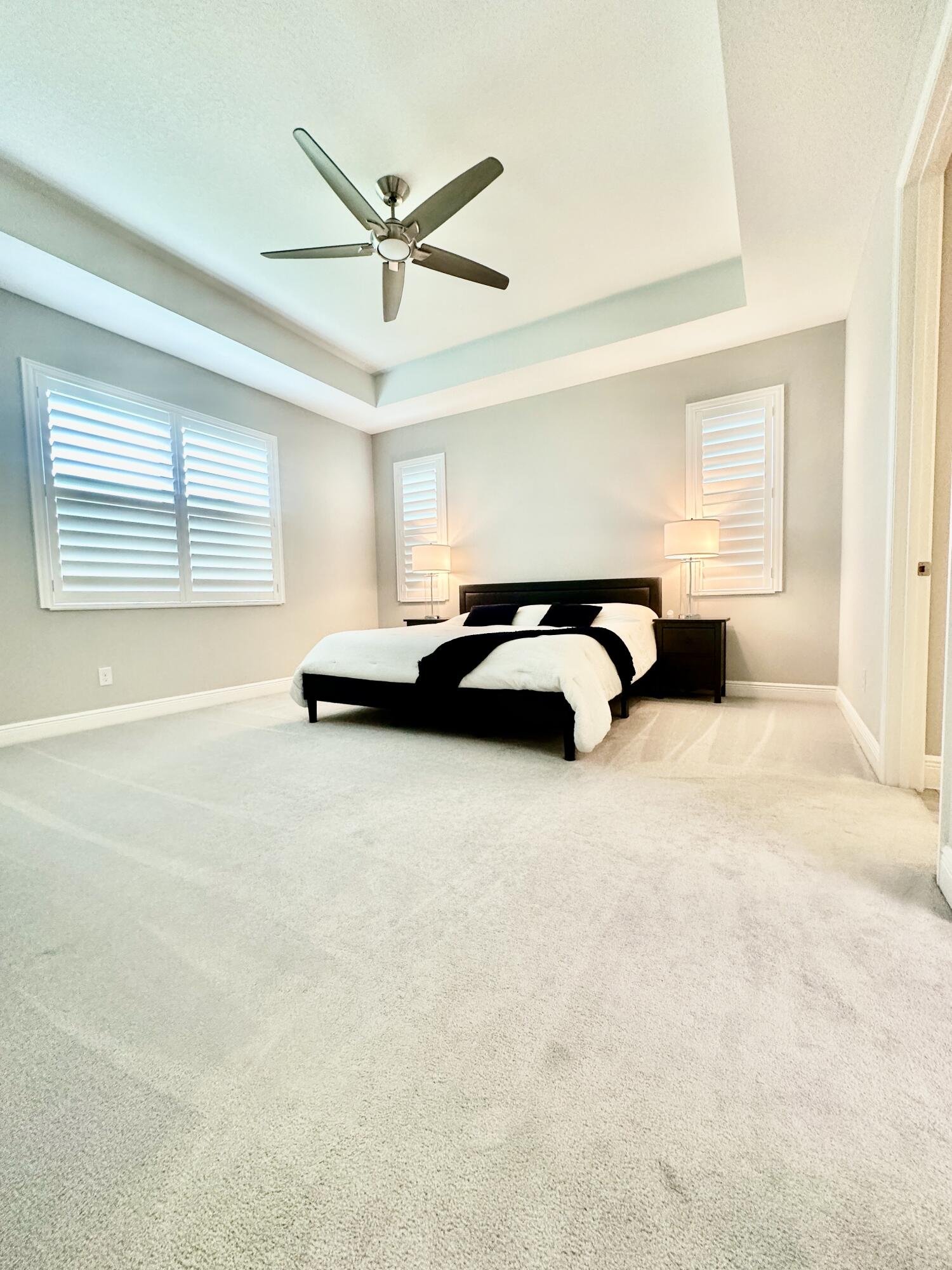 3044 Trasona Drive Melbourne, FL 32940 - Photo 15 of 36 a bedroom with a bed and window