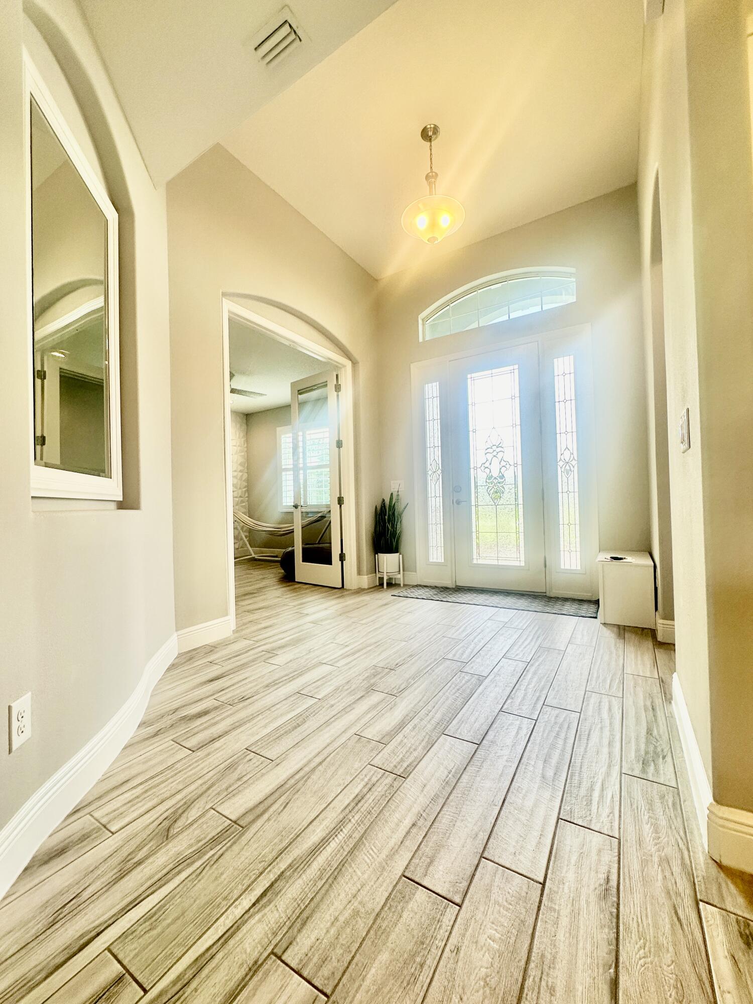 3044 Trasona Drive Melbourne, FL 32940 - Photo 23 of 36 a view of a house with a entertaining space