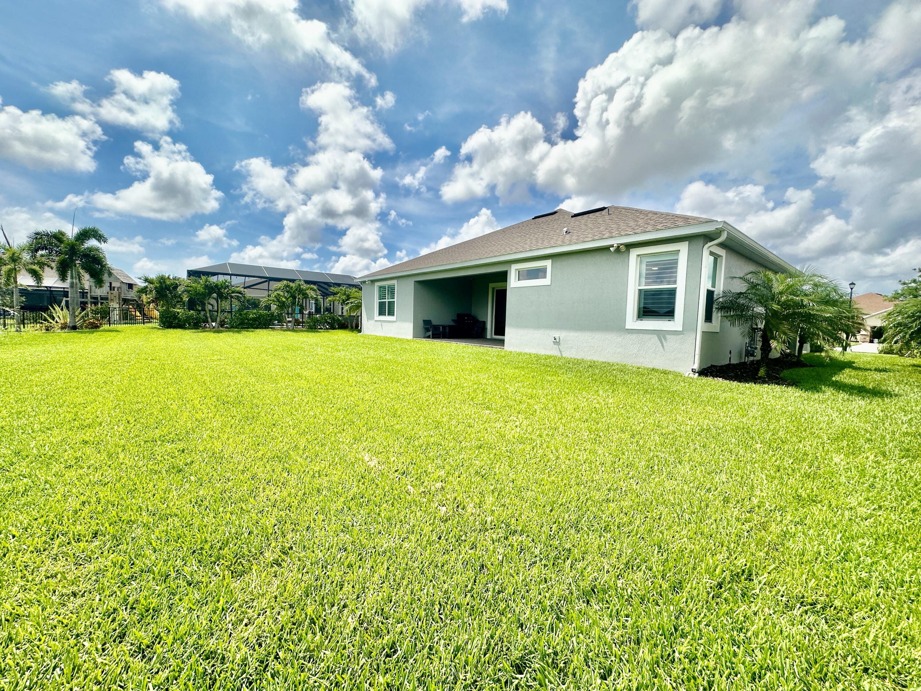 3044 Trasona Drive Melbourne, FL 32940 - Photo 29 of 36 a view of a house with a yard