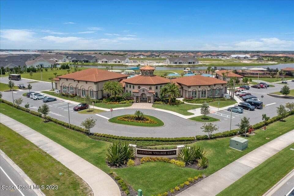 3044 Trasona Drive Melbourne, FL 32940 - Photo 31 of 36 an aerial view of residential houses and lake view