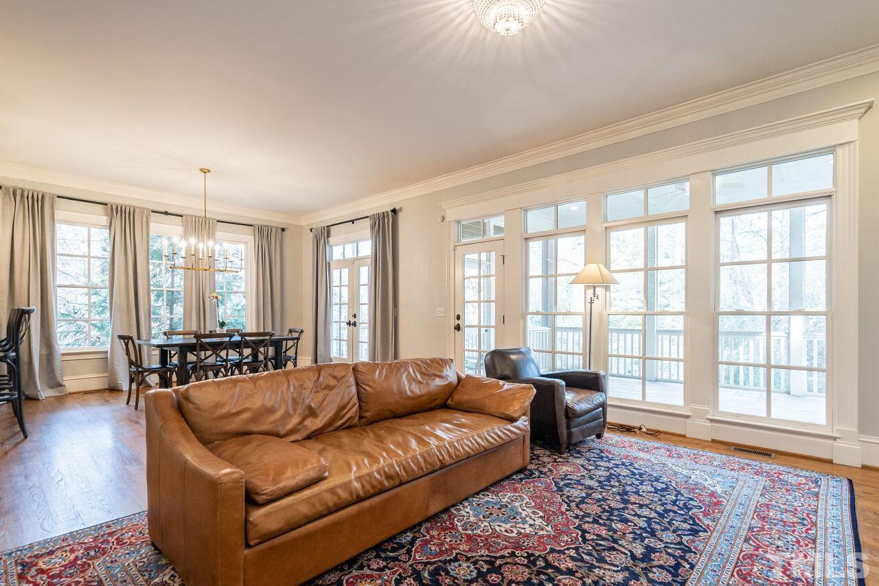 3056 Lewis Farm Road Raleigh, NC 27607 - Photo 11 of 43 a living room with furniture and a large window