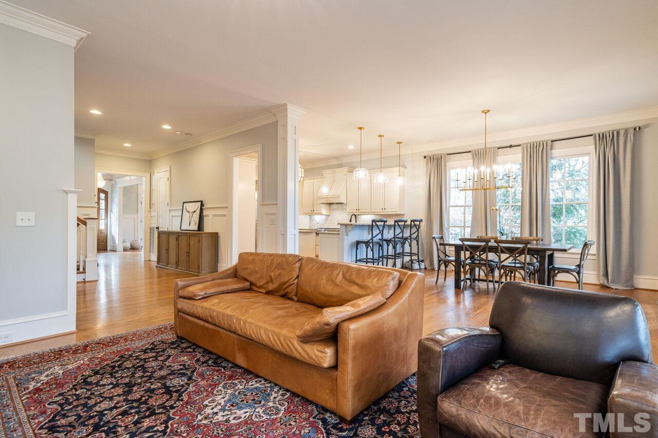 3056 Lewis Farm Road Raleigh, NC 27607 - Photo 12 of 43 a living room with furniture and a large window