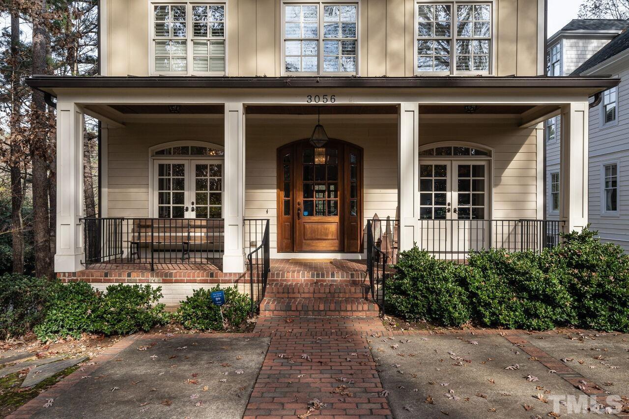 3056 Lewis Farm Road Raleigh, NC 27607 - Photo 2 of 43 a front view of a house with a porch