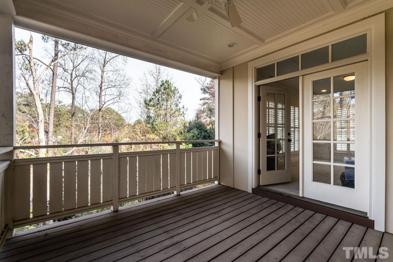 3056 Lewis Farm Road Raleigh, NC 27607 - Photo 24 of 43 a view of a balcony with wooden floor