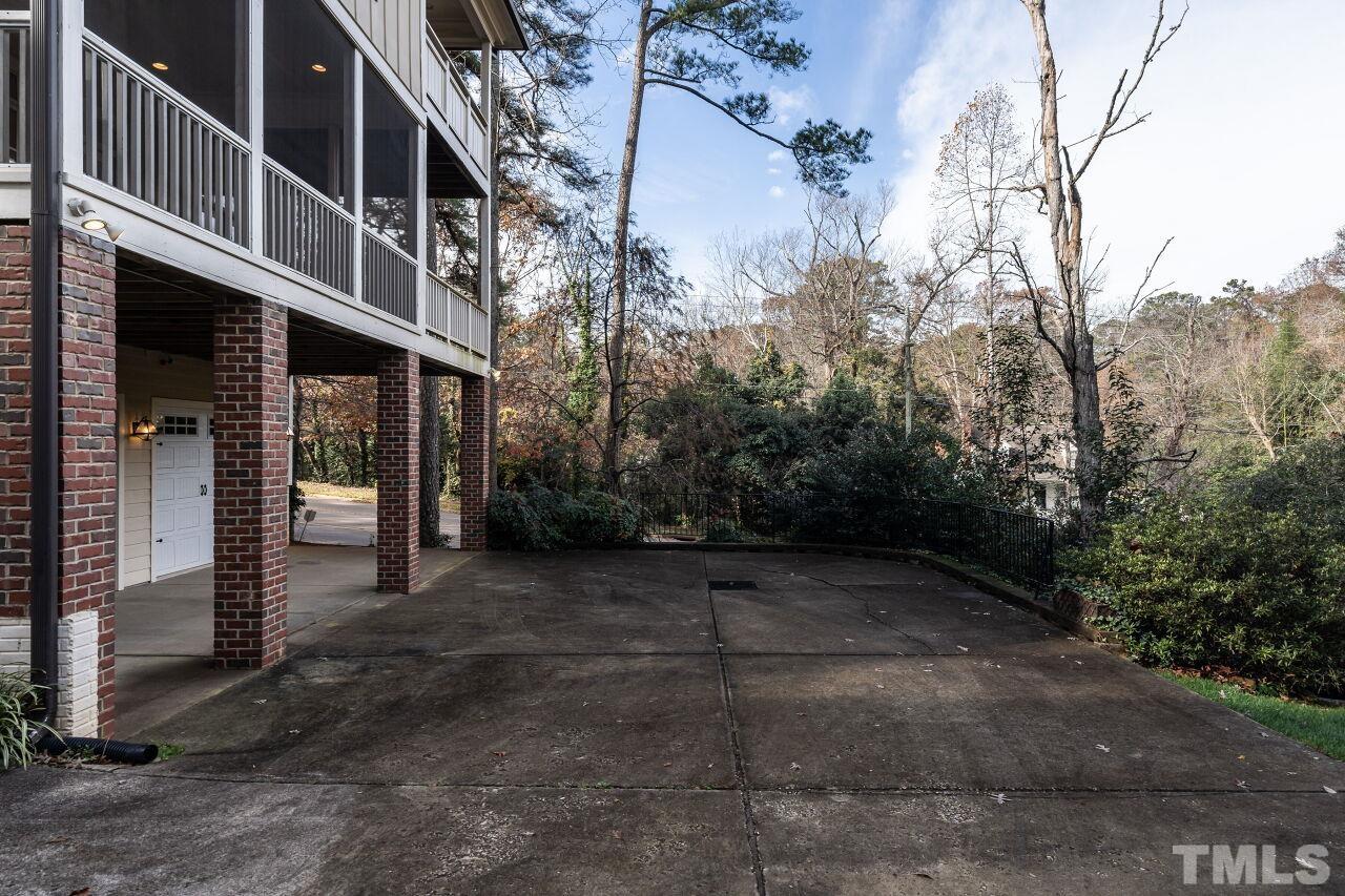 3056 Lewis Farm Road Raleigh, NC 27607 - Photo 41 of 43 a view of a house with a tree