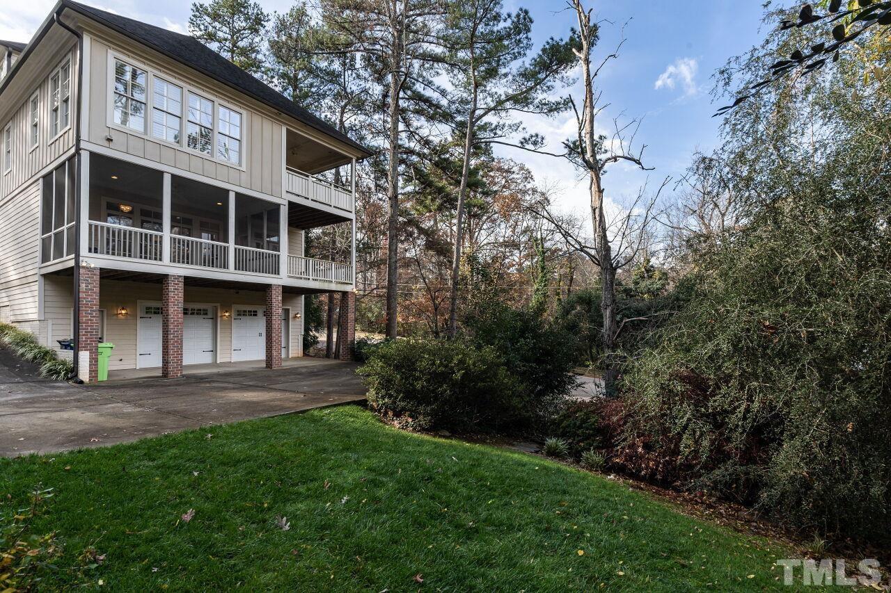 3056 Lewis Farm Road Raleigh, NC 27607 - Photo 42 of 43 a view of house with front yard