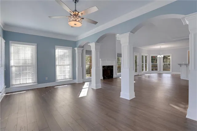 a view of a kitchen with a sink stainless steel appliances and cabinets