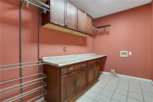 a bathroom with a bathtub and a sink shower